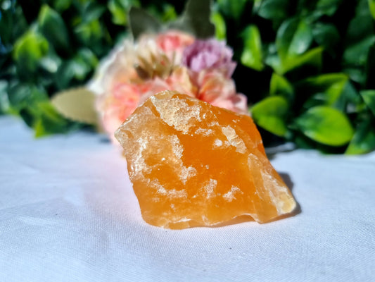 Orange calcite polished Raw