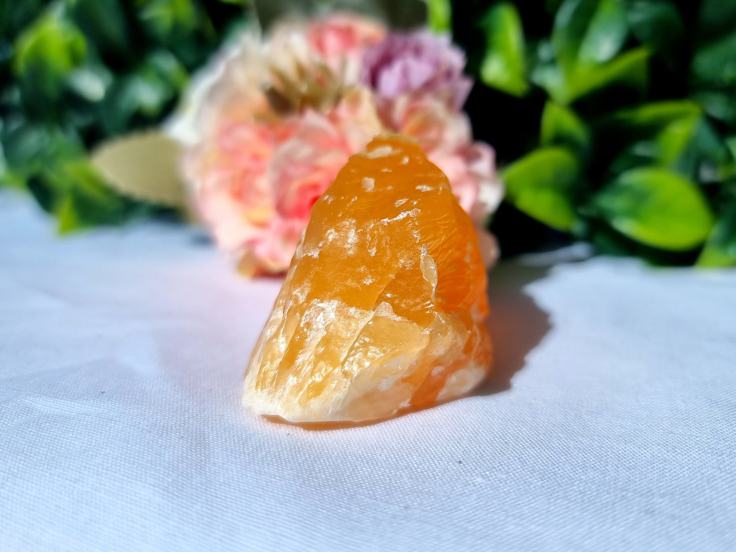 Orange calcite polished Raw